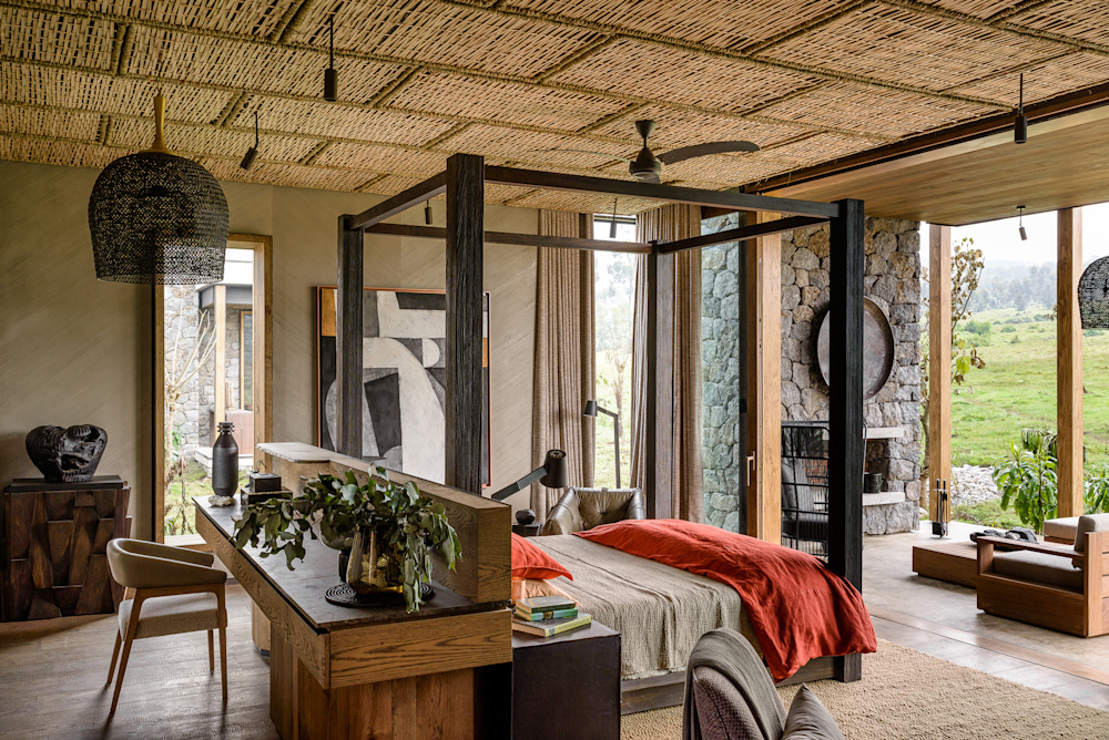 The warmth and sanctuary-like atmosphere of the location is echoed in the interiors at Singita Kataza House and Kwitonda Lodge in Rwanda