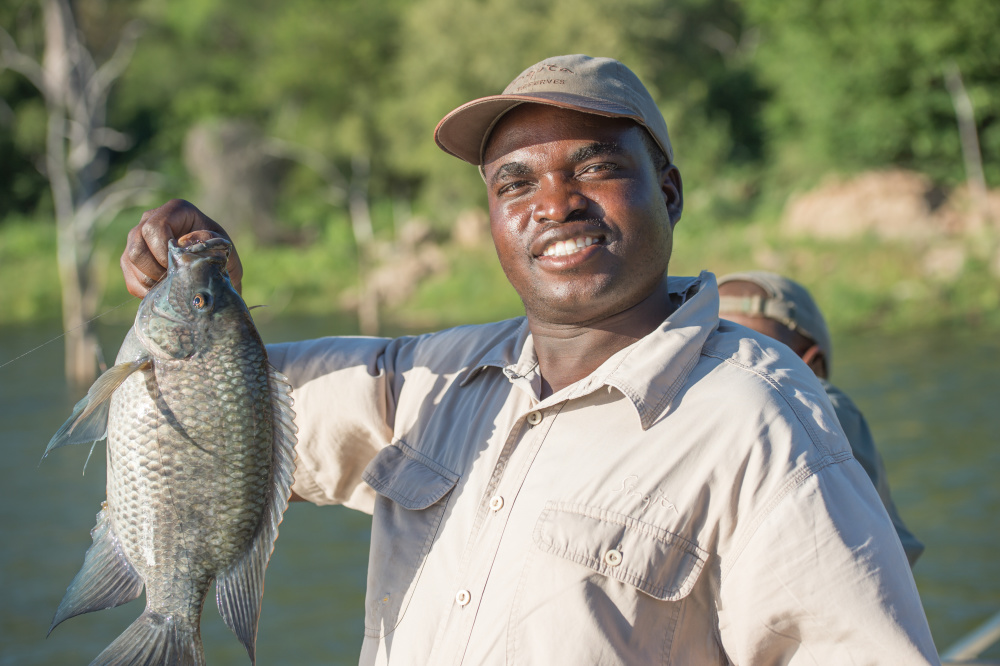 At our lodge and private villa in Zimbabwe, catching fresh fish in the Malilangwe Dam contributes to a fully immersive and local dining experience