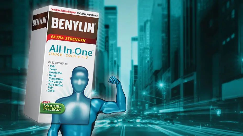 BENYLIN® Extra Strength All‑in‑One Cough, Cold & Flu product box beside a blue human figure flexing an arm, set against a dynamic city street background.