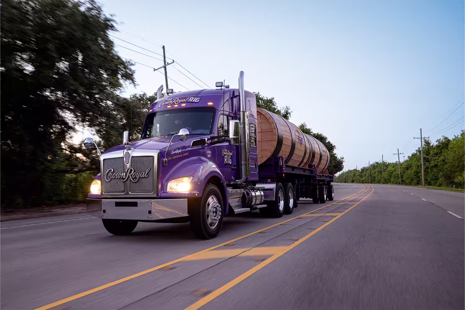 Kane Brown standing in front of the Crown Royal Rig 18 Wheeler