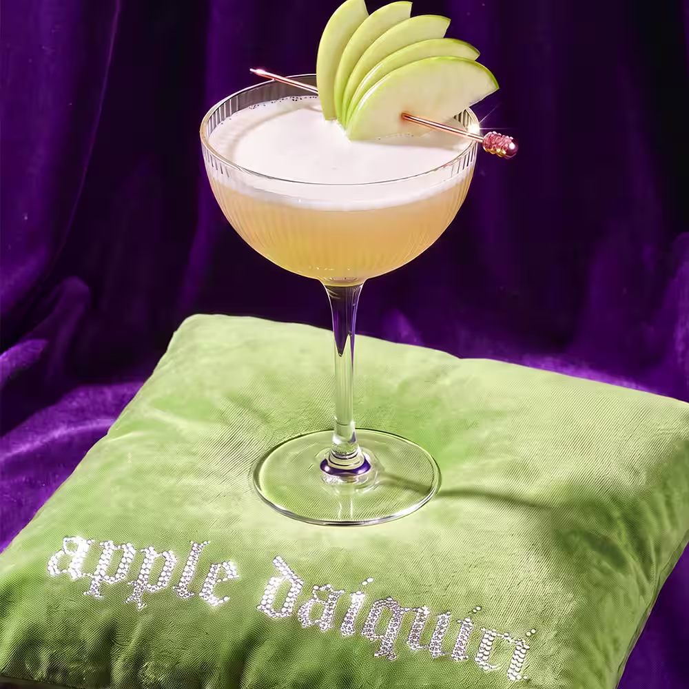 Martini Glass with apple slices as garnish 