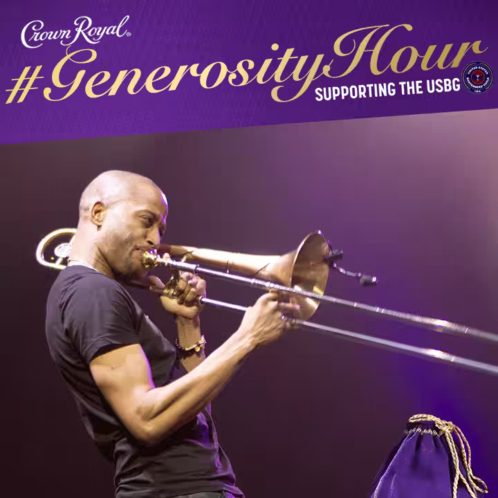 man playing a trombone in front of a purple banner