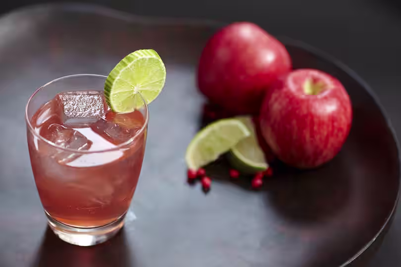 Enjoy a Crownberry Apple with Crown Royal® Regal Apple Whisky, and cranberry juice
