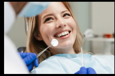 Patient smiling during a posterior restoration procedure