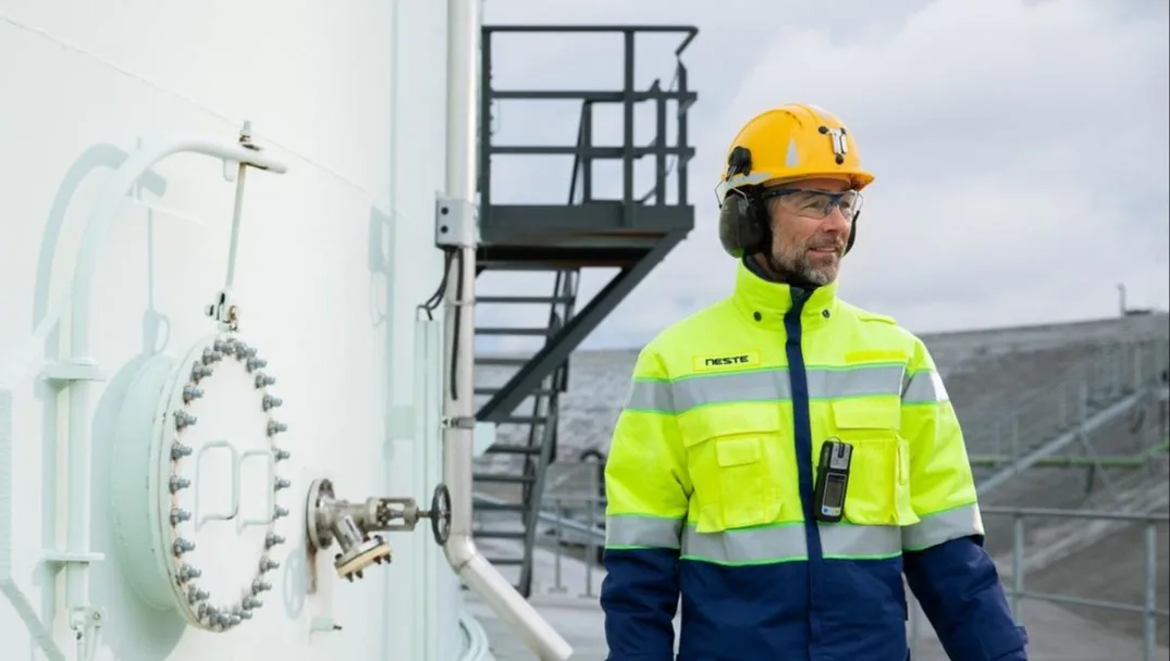 Manual worker at Neste refinery area.