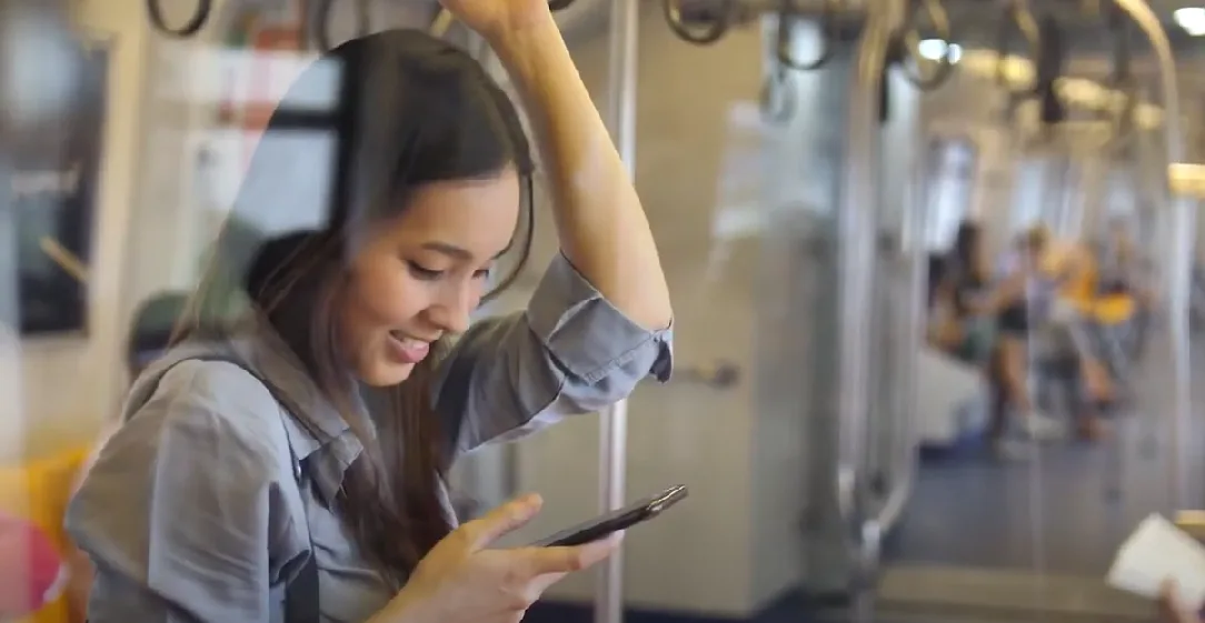 Woman travelling with the metro, sustainable mobility