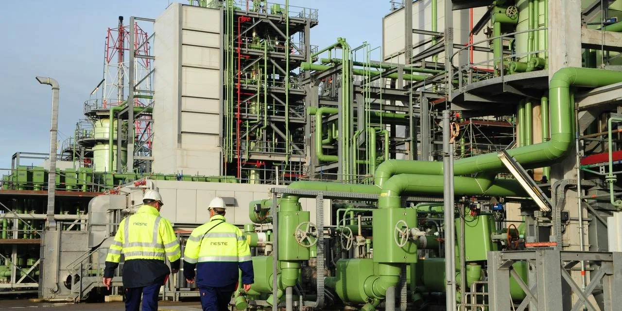 Employees walking at Neste's Rotterdam refinery 