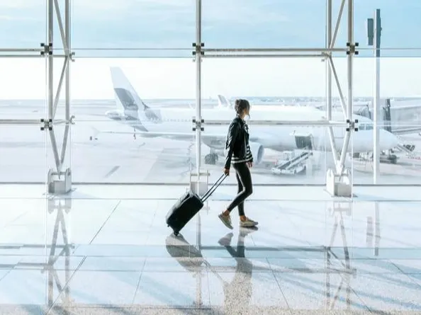 Close-up of a suitcase on a tiled floor