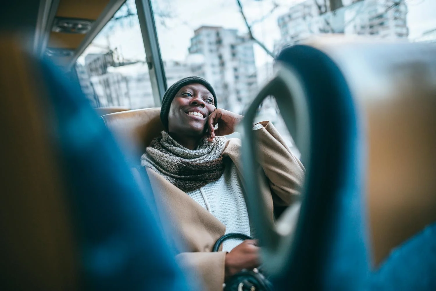 Woman travelling in public transport.