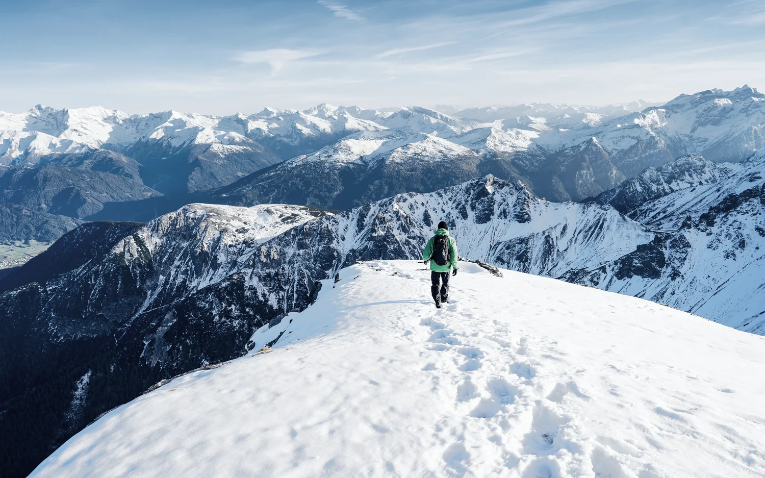 People walking on snowy mountain