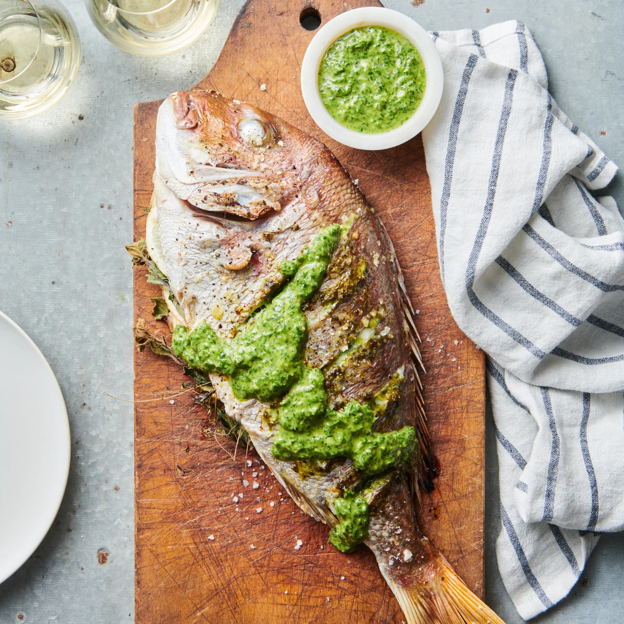 A delicious whole grilled fish with green herb dressing recipe. Best way to cook Snapper or any whole white fish. 