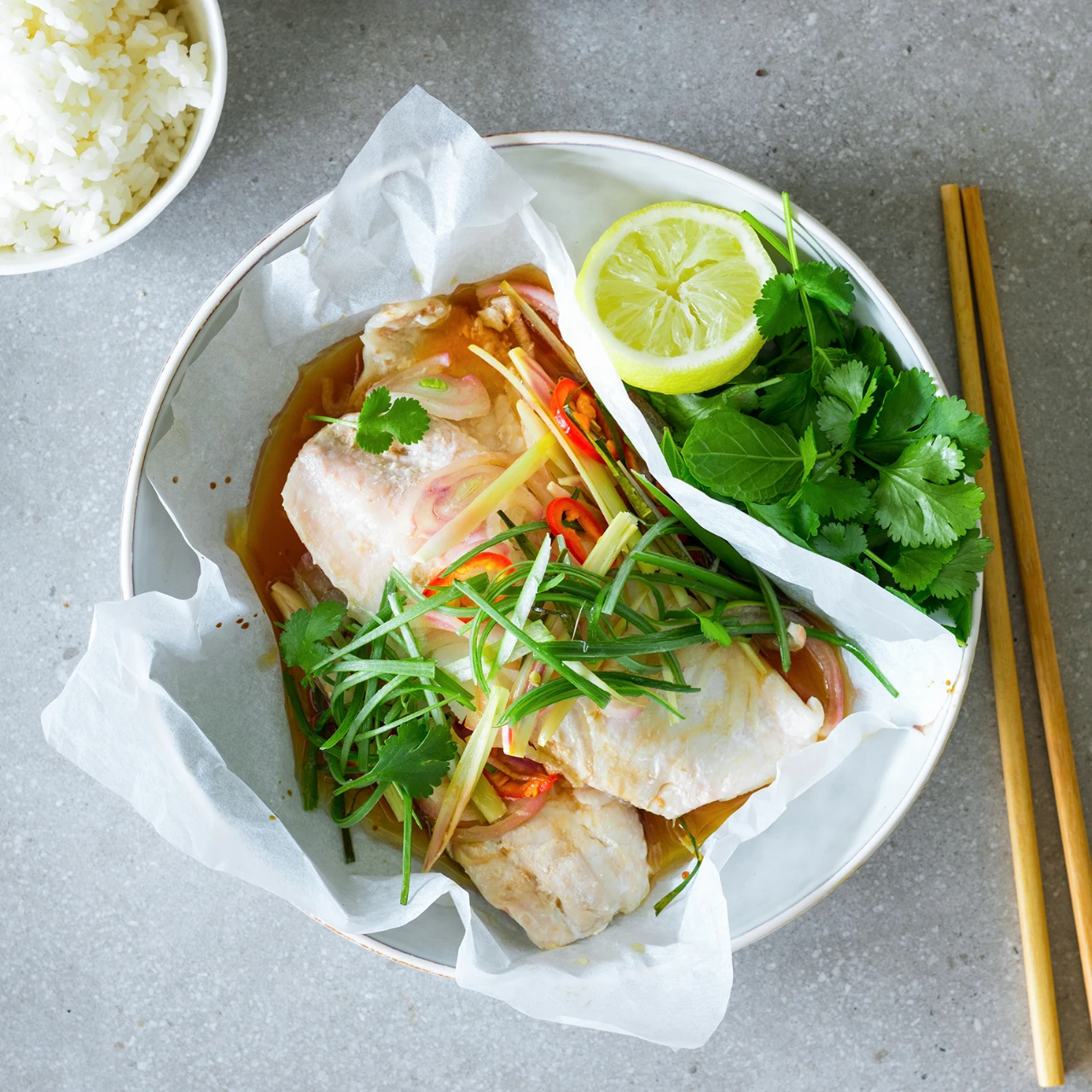 Make our easy Asian-inspired Steamed Fish Parcel Recipe with lemongrass and ginger. Use Snapper, Tarakihi or Gurnard fish.