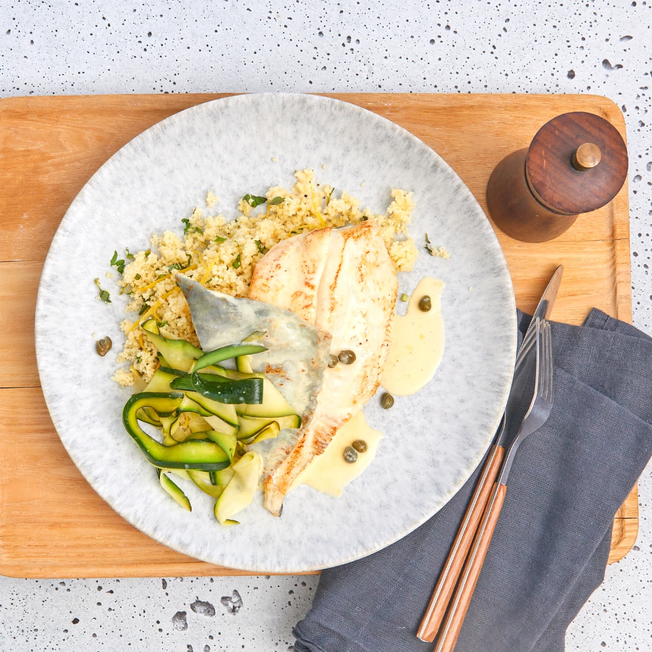 Seared Mirror Dory on Herby Couscous with Creamy Lemon Caper Sauce & Zucchini