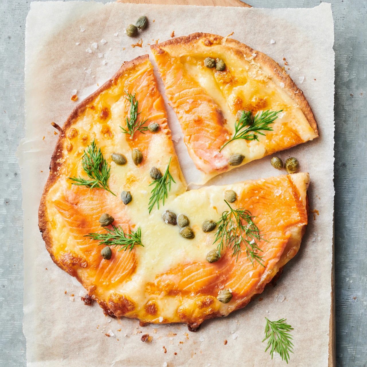 Try our NZ King Smoked Salmon Pizza Bianco Recipe. Made with thin slices of cold smoked salmon, parmesan and mozzarella.