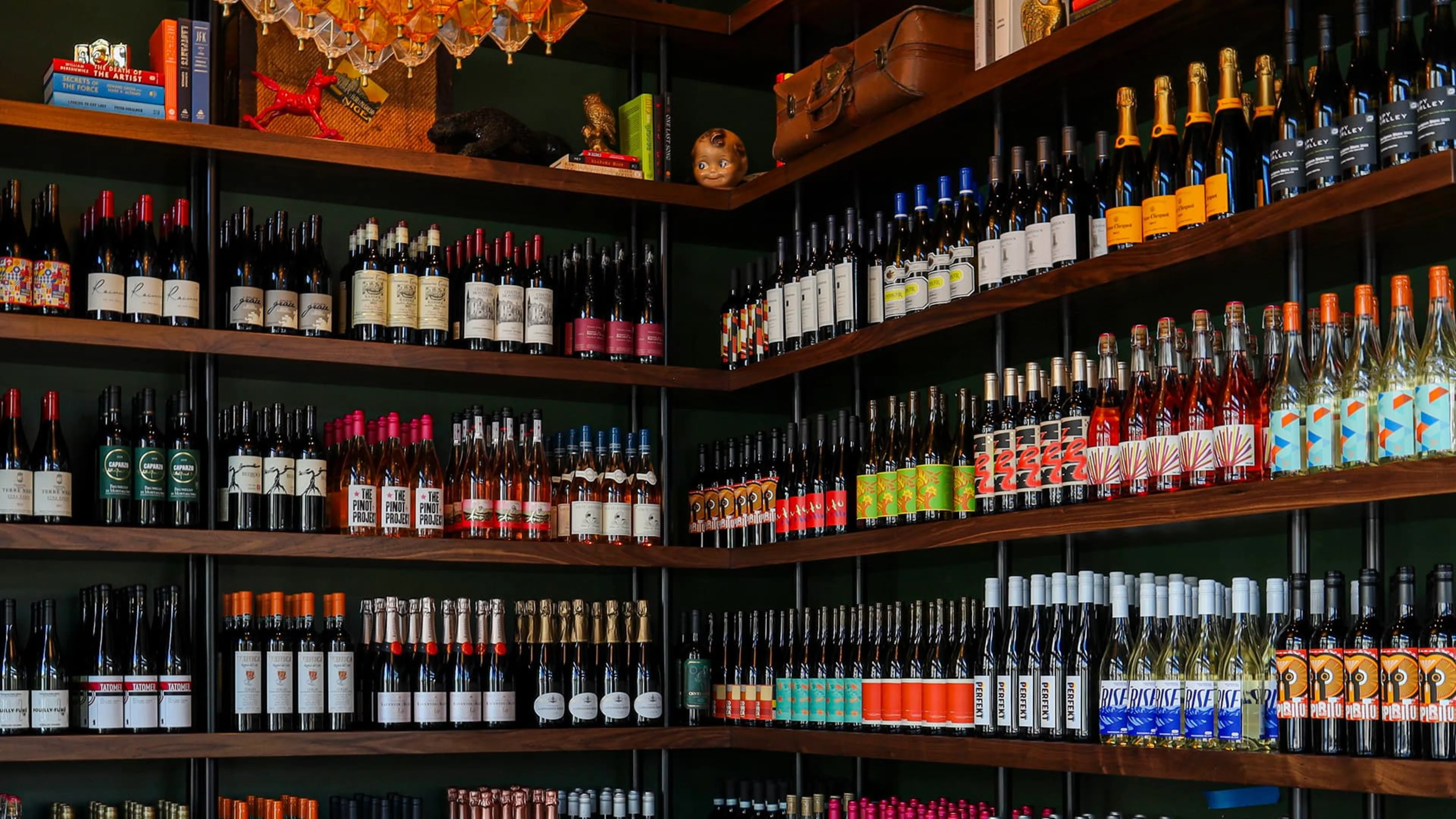 Shelves stocked with wine bottles