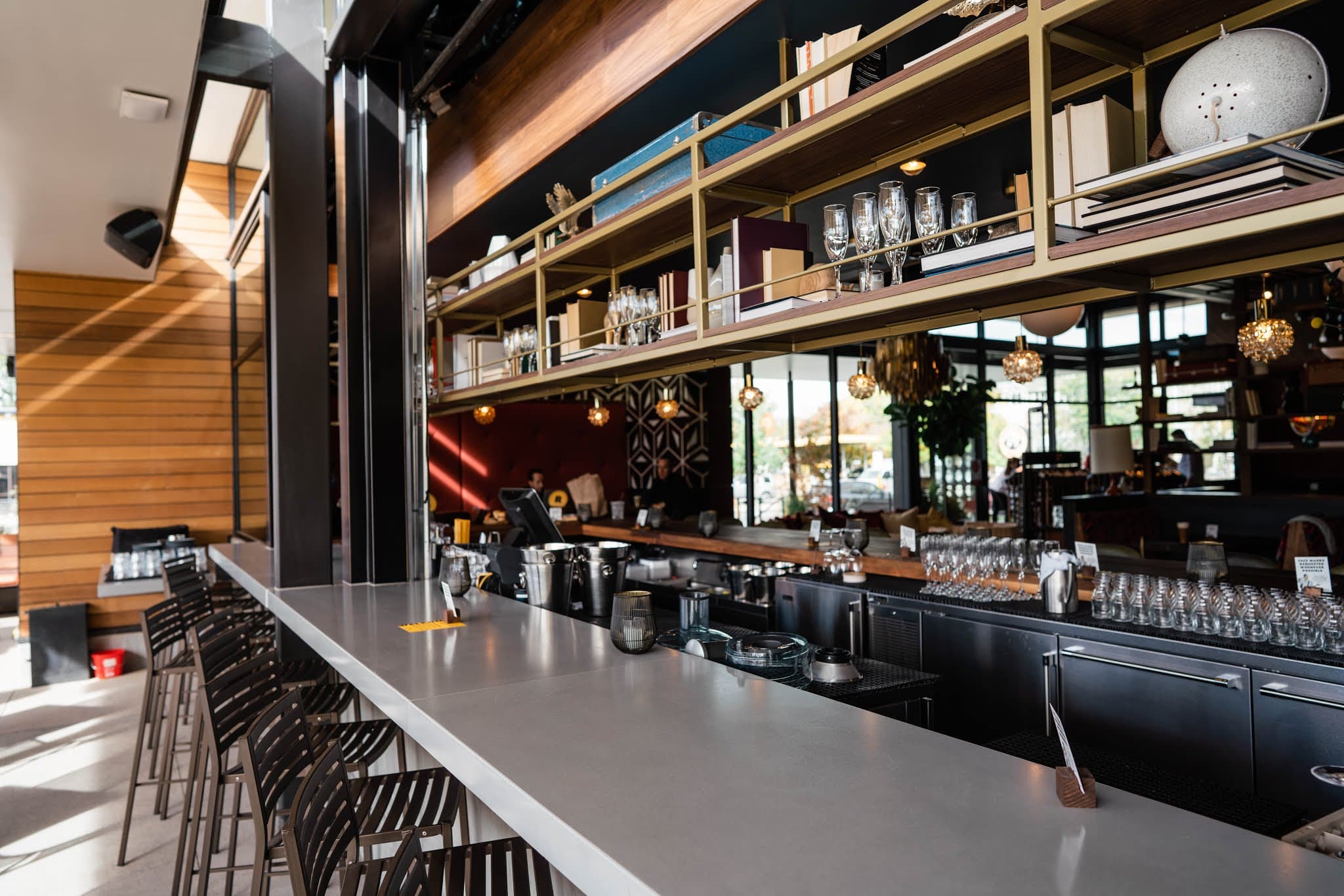 A long empty bar with high stools