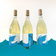 Three bottles of white wine on blue waves.