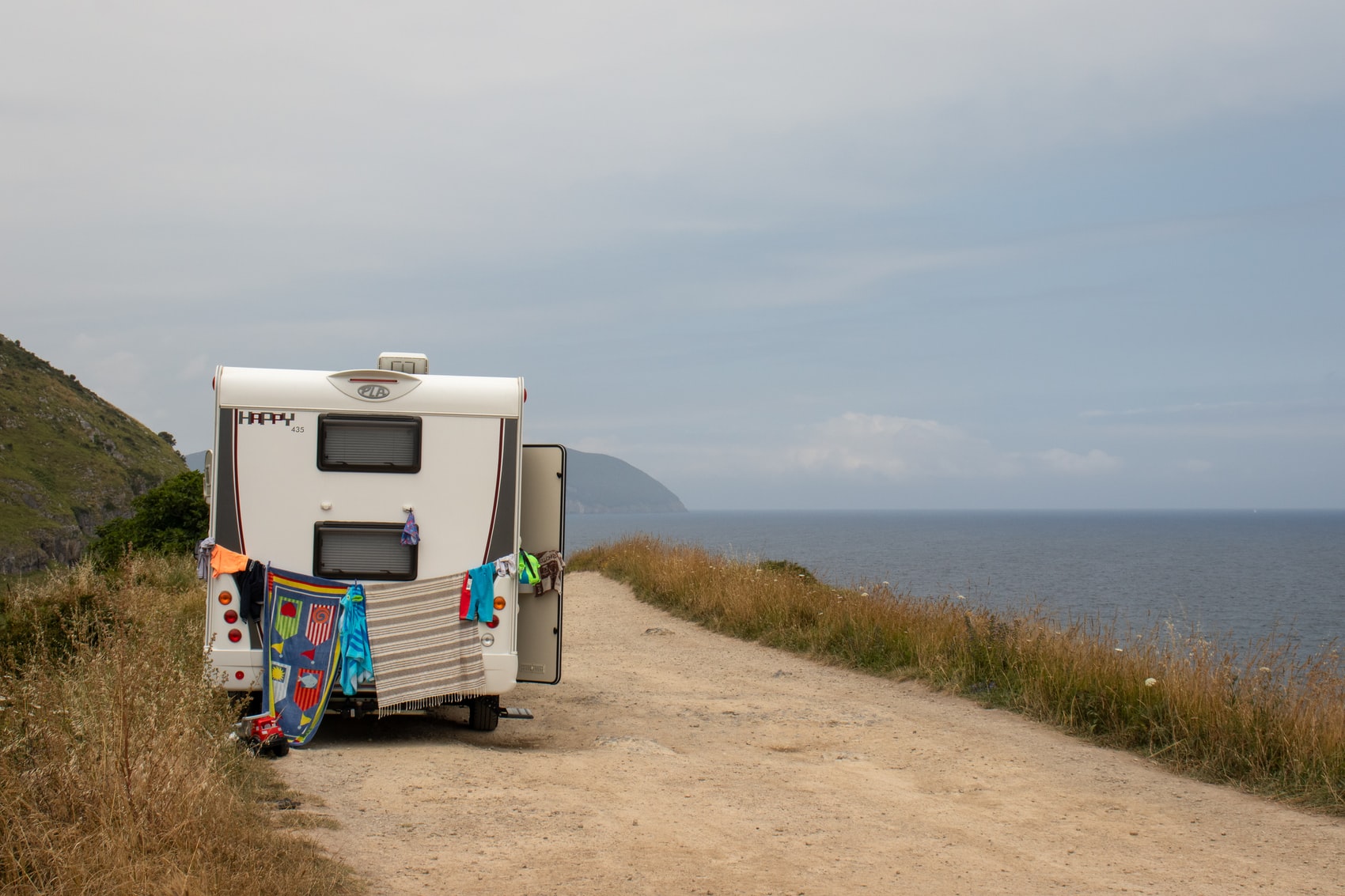 RV parked on dirt road