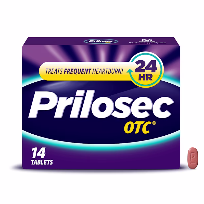 Un paquete de Prilosec OTC, caja de 42 tabletas con una tableta colocada al lado.