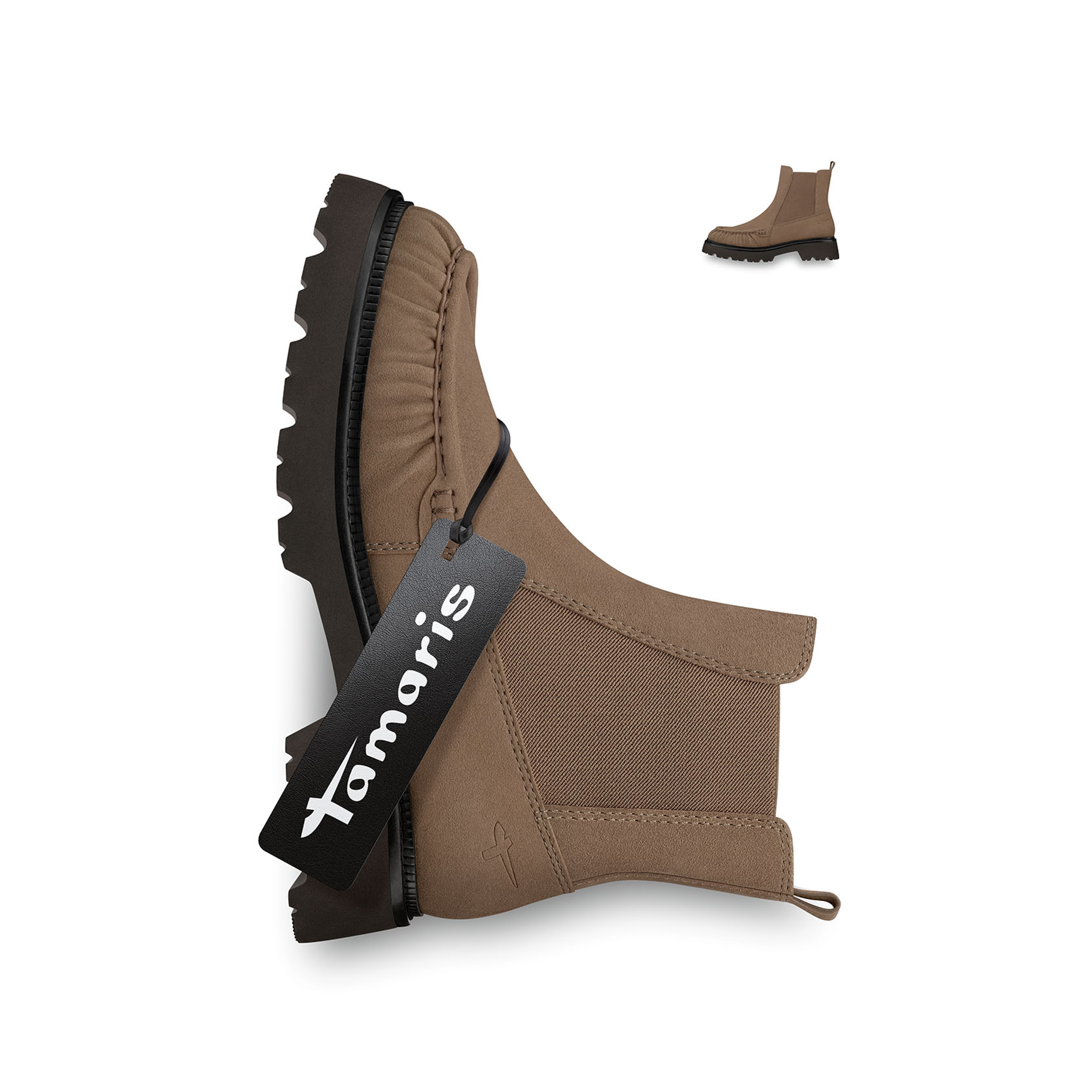 Stivaletto Chelsea Tamaris in colore taupe con suola carrarmato nera ed inserto elastico, presentato disteso con etichetta del marchio.