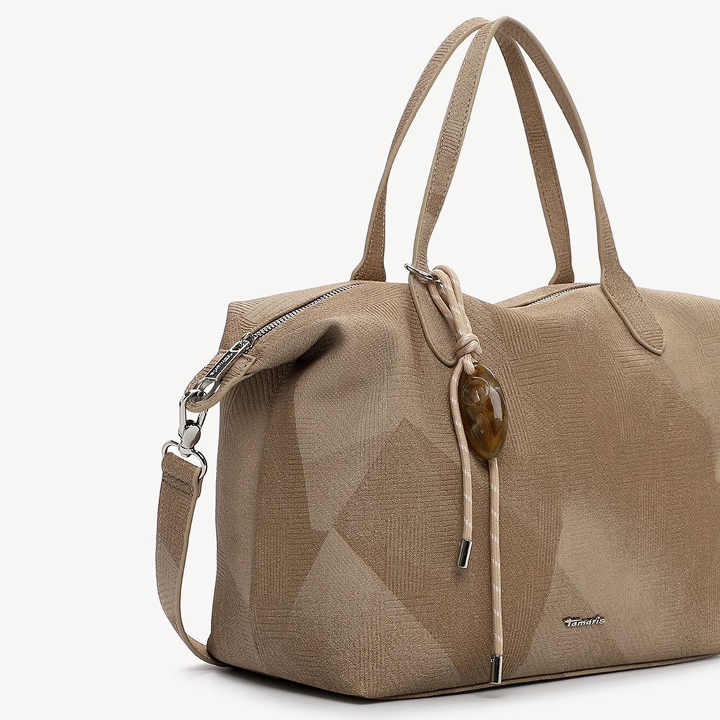 Elegant beige handv&auml;ska fr&aring;n Tamaris med dragkedja och b&auml;rhandtag, fotograferad mot vit bakgrund.