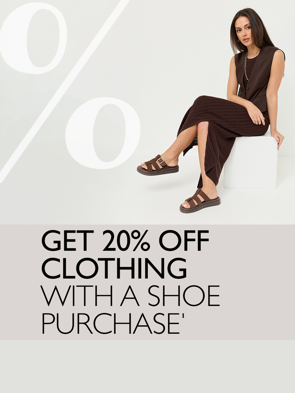 Woman in a brown outfit and sandals sits on a white cube. Offer: 20% off clothing when purchasing shoes.