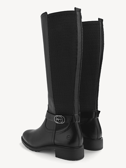 Bottes noires pour femme avec empi&egrave;cement en maille &eacute;lastique et talon plat.