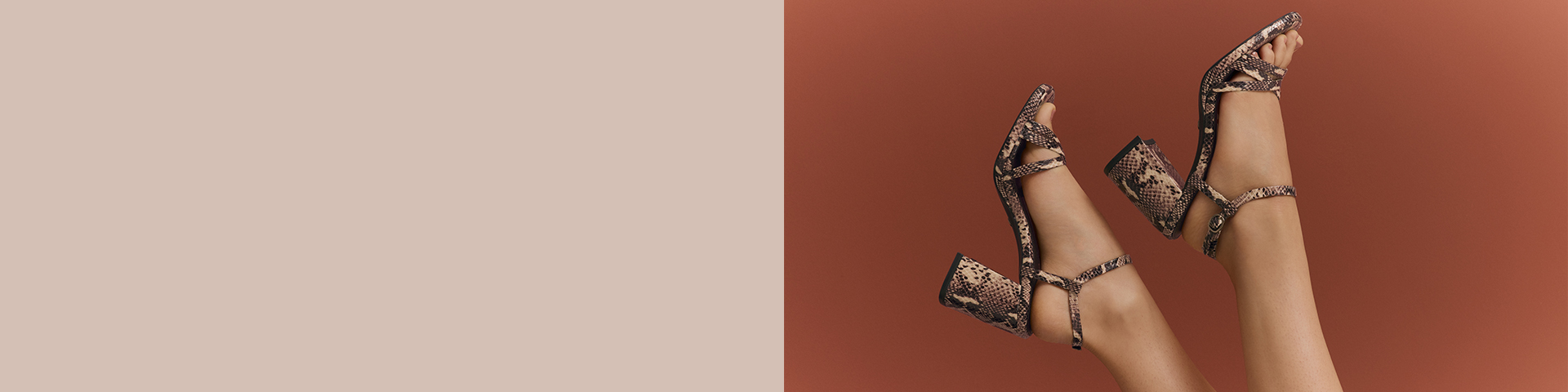 Elegant sandals with a snakeskin pattern and block heel against a brown background.