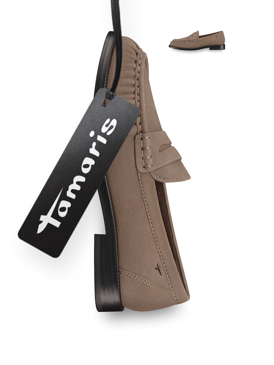 Tamaris loafer in taupe suede with a black sole.