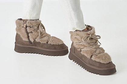 Stivali invernali beige con bordo in pelliccia