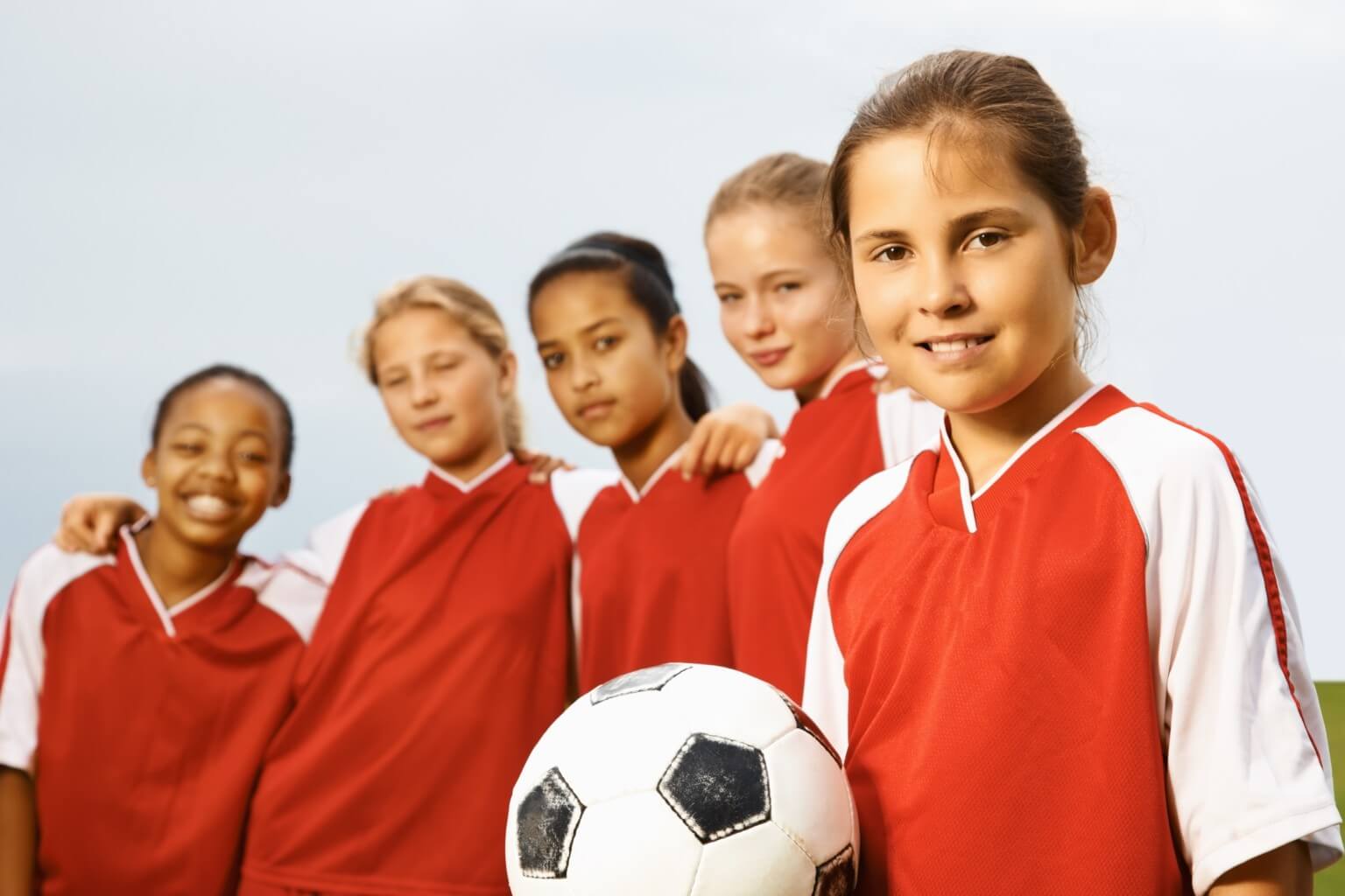 A soccer team standing together.