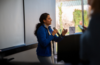 woman addressing an audience