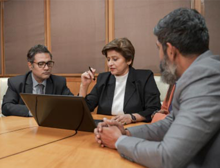 Image showing three corporate professionals in discussion