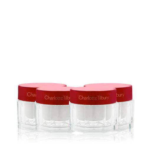 A collection of pearly-white face creams in glass jars with eye-catching, red-coloured lids. 