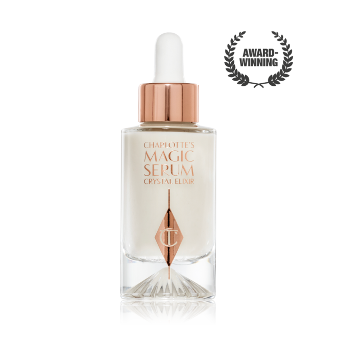 An award-winning, luminous, ivory-coloured serum in a glass bottle with a gold and white-coloured dropper lid.