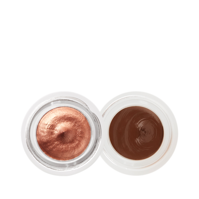 Two cream eyeshadows in soft gold and coppery-rose gold shade in glass pots with dark brown lids with the CT logo printed on the top.