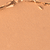 Swatch of a pressed powder in a warm sand colour.