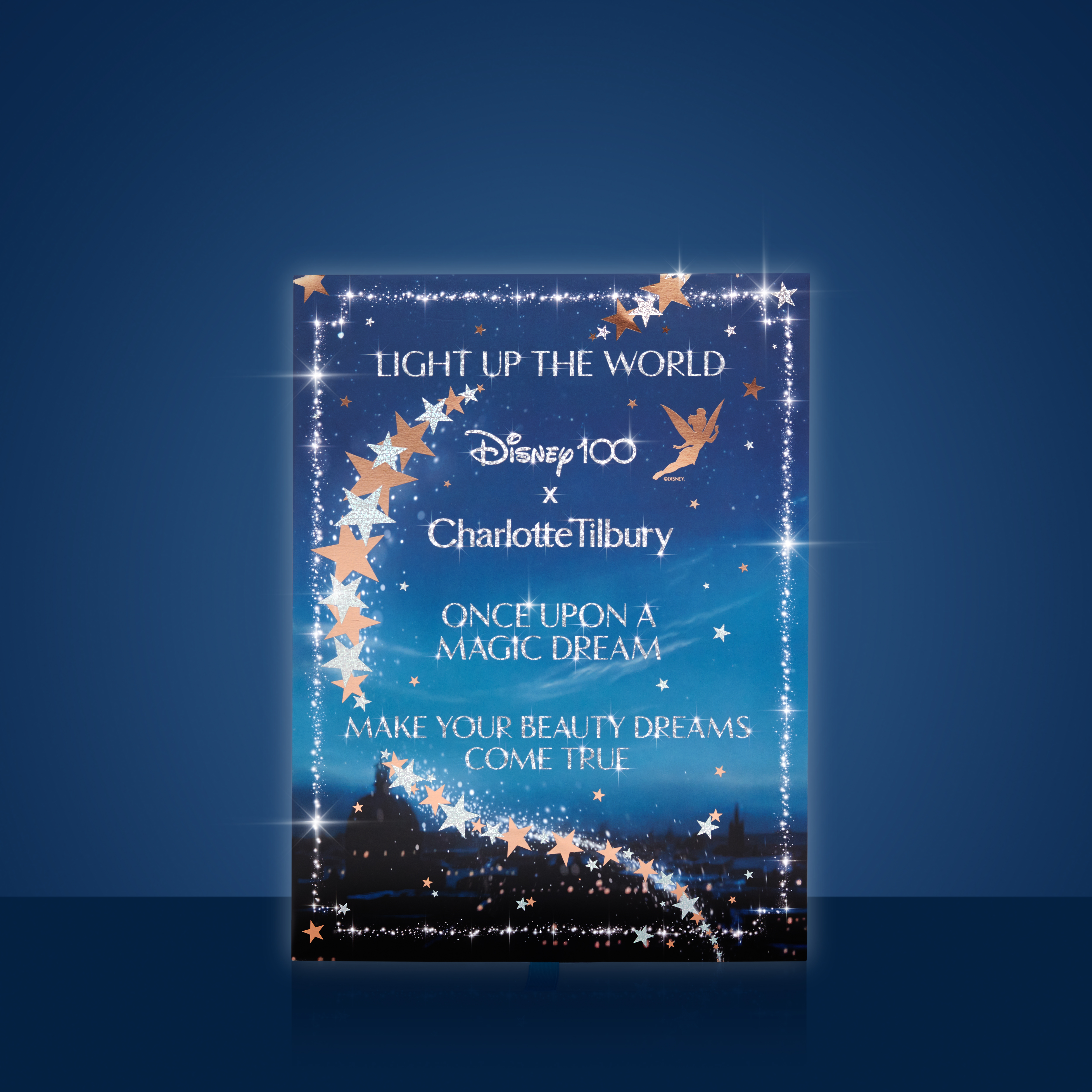 Disney100 x Charlotte Tilbury (NAME) closed box with blue background.