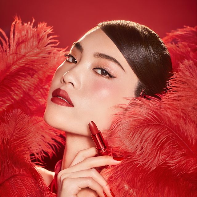 Cheng wearing Mark of a Kiss muted red Valentine's Day lipstick