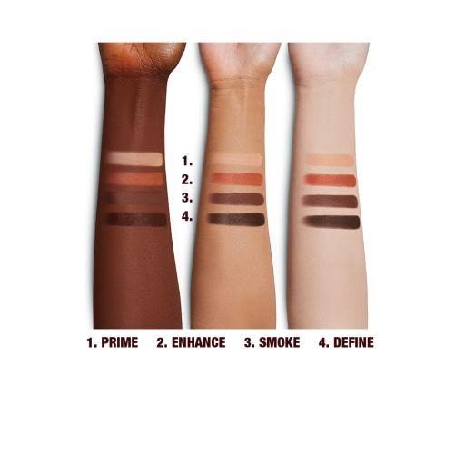 Swatches of four eyeshadows in shades of brown and champagne on light, fair and deep-toned arms. 