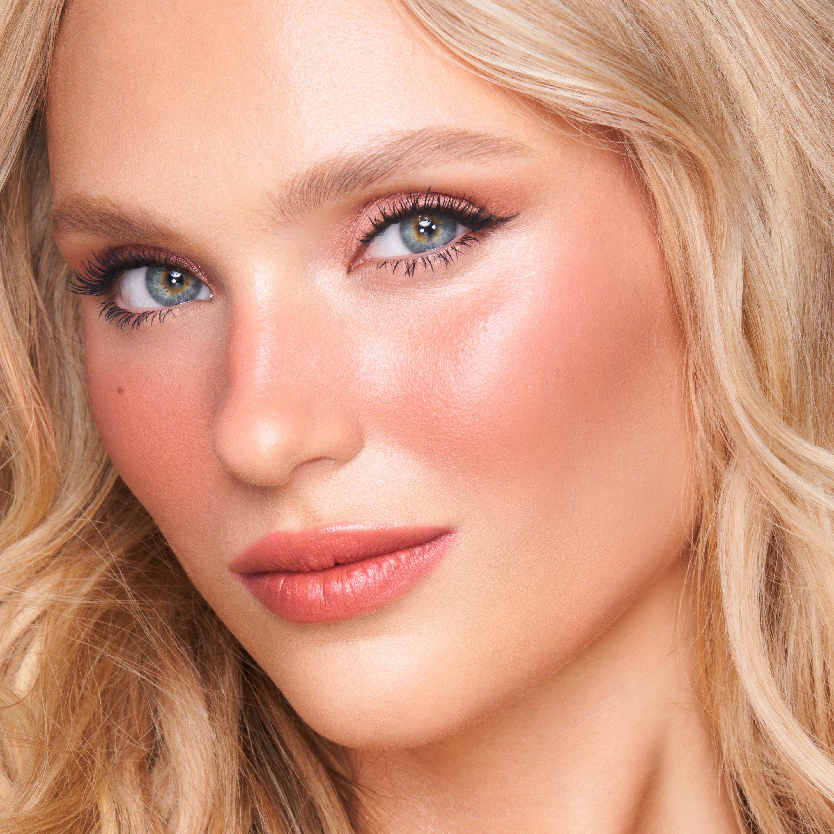 Model wearing a beach wedding makeup look