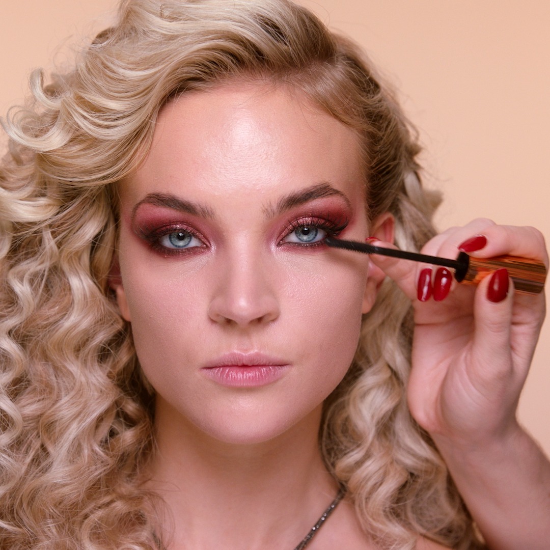 Step 8 in Sofia Tilbury's 80s Makeup Look tutorial: apply mascara