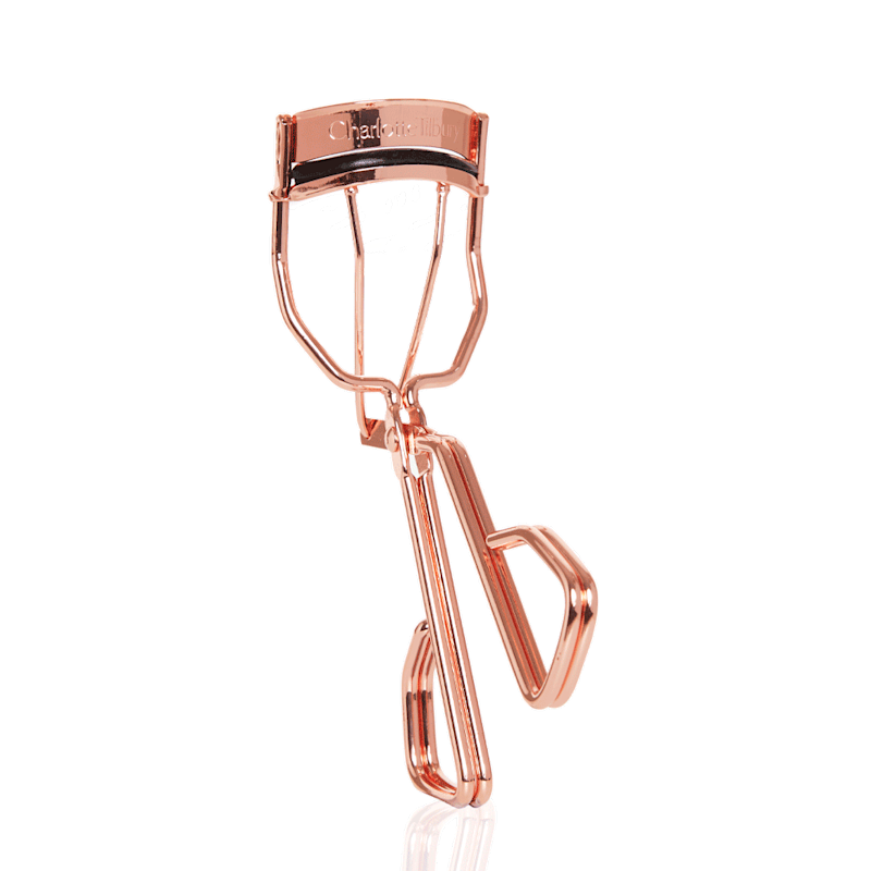 Metallic, rose gold-coloured lash curler.