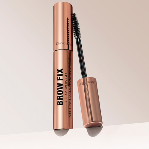 Sculpting eyebrow gel with a spoolie applicator in rose-gold-coloured packaging.