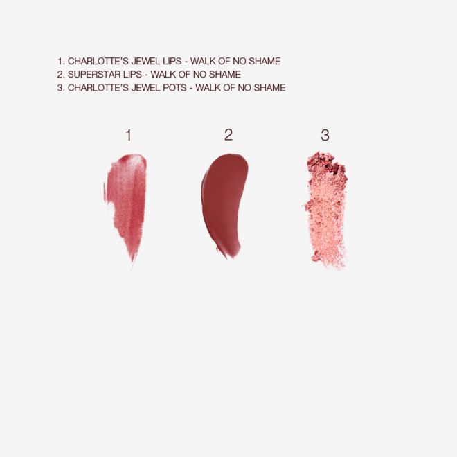 Jewel Eye Lip Secrets in Walk of No Shame swatches Swatches of a glittery lip gloss in a berry pink colour, lipstick in a berry pink shade, and cream eyeshadow in a s=russet rose colour with a gold sparkle.