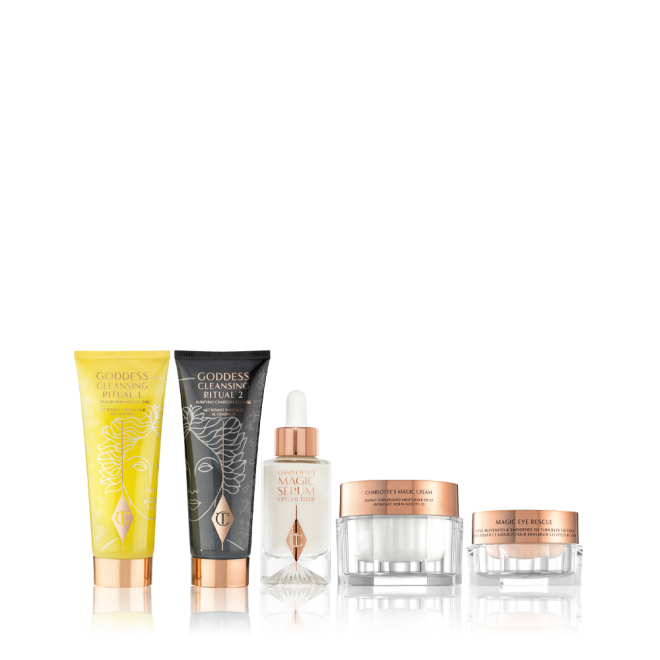 Two facial cleansers, one in lemon-yellow packaging and the other in charcoal-black with a pearly-white face serum in a glass bottle, and a white face cream with a champagne-coloured eye cream in glass jars. 