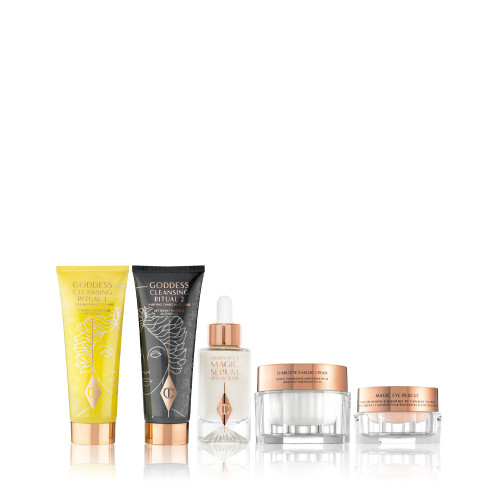 Two facial cleansers, one in lemon-yellow packaging and the other in charcoal-black with a pearly-white face serum in a glass bottle, and a white face cream with a champagne-coloured eye cream in glass jars. 