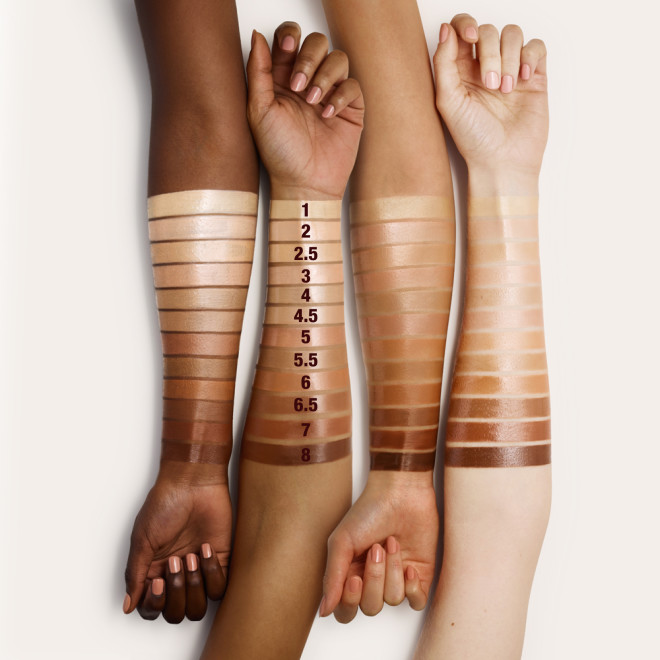Fair, medium, and deep-tone arm swatches of a glow-boosting primer in twelve shades for fair, light, medium-light, medium, medium-dark, and deep tones. 