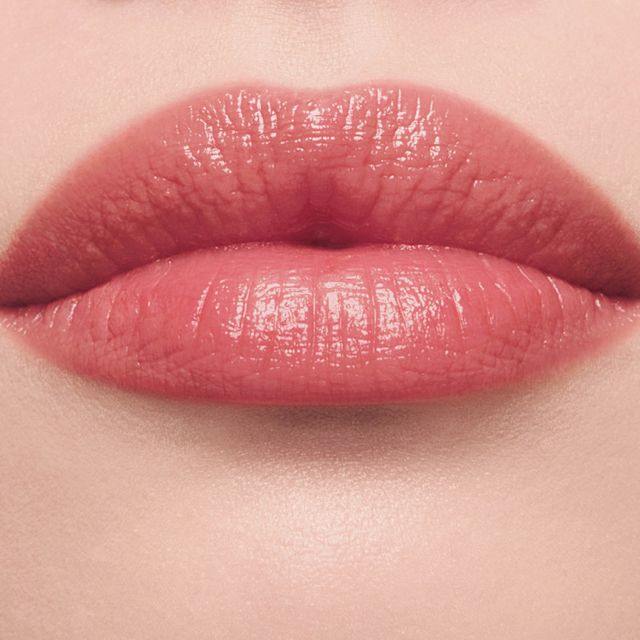 Blushed Rose lip tint on fair skin close up