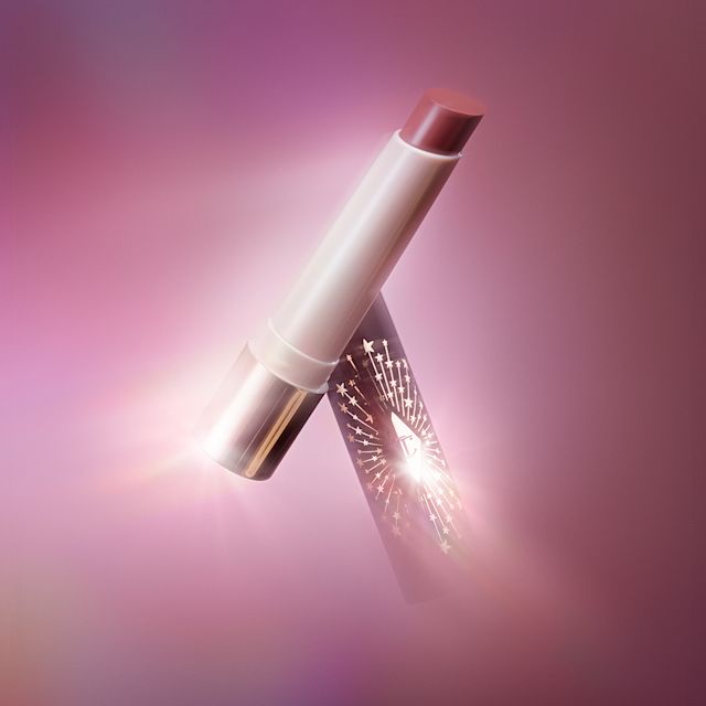 Hyaluronic Happikiss Pillow Talk lipstick balm with Pillow Talk backdrop